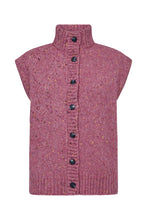 Load image into Gallery viewer, The Holly Button High Neck Knit offers a modern, sculptural approach to layering. Designed with a structured high neck and clean, sleeveless silhouette, this chunky knit vest is finished with a full button-down front for versatile styling. The speckled texture adds subtle depth and character, making it a refined yet playful addition to seasonal wardrobes.
Size & Fit
• Regular fit
• High neckline
• Hip length
Details
• Sleeveless knit vest
• Full button-through front
• Ribbed neckline, placket and hem