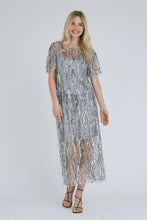 Load image into Gallery viewer, Fenja blouse is a feminine blouse in a light, transparent quality with fine sequin details. The blouse has short sleeves and a relaxed fit, which gives an elegant and airy look. Under top included.

The blouse is true to size. The model is 175 cm tall and wears

a size S/36.- Slightly transparent quality
- Sequin details

Quality: 100% Polyester
Washing instructions: Follow instructions on care label.