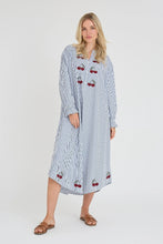 Load image into Gallery viewer, Alize dress is a feminine, long dress with a v-neck and long sleeves. The dress has embroidered details at the chest and bottom, which gives a decorative and elegant look. It closes with three buttons at the chest.

The dress is true to size.

- V-neck with buttons
- Long sleeves
- Embroidered details

Quality: 70% Cotton 30% Polyester