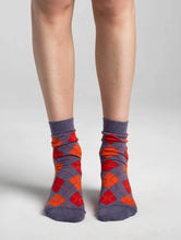 Load image into Gallery viewer, Short cut, full commitment to the colour

KRAKOW ORIGIN - The argyle, rewritten. Classic knit with harlequin pattern — a heritage pattern that finally looks like right now.

OEKO-TEX® certified combed cotton meets trend-driven colour palettes.

All our socks are produced in Georgia at our SEDEX-certified factory, ensuring responsible working conditions, high quality standards, and thoughtful production from start to finish.

Cotton Combed 75% / Polyamide 20% / Elastane 5%