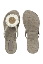 Load image into Gallery viewer, Step into summer with effortless elegance. These charming flip-flops combine beauty and comfort in one light, flexible design—ideal for beach walks, garden gatherings, or warm days in the city. A shimmering thong strap and bold decorative flower elevate this casual essential into a feminine statement piece. With their air-infused sole and gentle massage effect, they’re designed to keep your feet happy all day long.

Lightweight sole with induced air for flexibility and comfort
