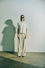 Load image into Gallery viewer, CMTAILOR-PANTS is a pair of high waisted pants in a premium material with concealed hook-and-eye and zip fastening, side pockets, a loose fit as well as pleats and creases in the straight, wide legs. A detail that adds a refined touch.


Loose fit
High waist
Creases and pleats in the straight, wide legs
Hook-and-eye and zip fastening
Side pockets