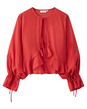 Load image into Gallery viewer, CMMOLLY-SHIRT is a long-sleeved shirt in a premium material with tie-strings on the front and in the sleeves as well as large ruffles that highlight the elegant, loose fit.


Long sleeves with tie strings
Tie-string on the front
Large ruffles
Loose fit
