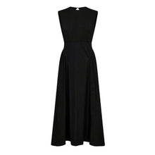 Load image into Gallery viewer, CMPOPPI-DRESS is a dress in a premium material with subtle sewing details, a wide skirt with pleats as well as an open back with button fastening in the neck. In addition, the dress has an adjustable drawstring at the waist for an elegant look.

Subtle stitching
Wide skirt with pleats
Open back
Button fastening in the neck
Adjustable drawstring at the waist