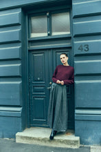 Load image into Gallery viewer, CMSHINMI-SKIRT is a skirt in a super soft material with black and silver glitter mix and lining. In addition, the skirt has a concealed side zip fastening, side pockets and wide pleats that add an elegant, pleated look.


Concealed side zip fastening
Wide pleats
Side pockets
Back length in a size S is 102 cm. Lining is 55 cm

