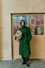 Load image into Gallery viewer, CMSLOANE-COAT is a long, structured trench coat in a heavy wool mix with a clean V-neckline and softly dropped shoulders. Double-layer belt and tonal logo embroidery across the upper back. Neat inside pocket with triangle flap detail
Heavy woven wool mix
Regular straight fit Long, straight silhouette with dropped shoulders
Double-layer belt that defines the waistline
Tonal logo embroidery across the back yoke
Back length in size S is 134 cm. All measurements are indicative ,