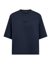 Load image into Gallery viewer, CMMUSE-TEE is a boxy-fit t-shirt crafted in stretchy organic cotton jersey for comfort and durability. Designed with a clean crew neckline and finished with a tonal 3D embroidered CMC logo at the chest for a refined signature touch.

Organic cotton jersey with soft stretch
Boxy silhouette with dropped shoulders
Rounded neckline
Tonal 3D CMC logo embroidery at chest
Back length from shoulder seam in size S is 60 cm. All measurements are indicative and may vary