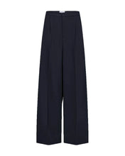 Load image into Gallery viewer, CMTAILOR-PANTS is a pair of high waisted pants in a premium material with concealed hook-and-eye and zip fastening, side pockets, a straight fit as well as pleats and creases in the legs. A detail that adds a refined touch. All the styles in the Tailor-line come in the same premium material, making them ideal for combining to create a complete look.

Straight fit
High waist
Creases
Hook-and-eye and zip fastening
Side pockets
Pleats

Composition: 64% Polyester,&nbsp;34% Viscose,&nbsp;2% Elastane

