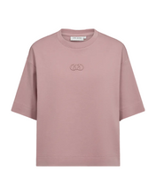 Load image into Gallery viewer, CMMUSE-TEE is a boxy-fit t-shirt crafted in stretchy organic cotton jersey for comfort and durability. Designed with a clean crew neckline and finished with a tonal 3D embroidered CMC logo at the chest for a refined signature touch.


Organic cotton jersey with soft stretch
Boxy silhouette with dropped shoulders
Rounded neckline
Tonal 3D CMC logo embroidery at chest
Back length from shoulder seam in size S is 60 cm. All measurements are indicative and may vary