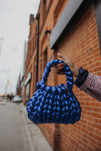 Load image into Gallery viewer, Candy Bag – Bold, Glossy &amp; Unforgettable

A striking statement piece with a high-shine, metallic finish. The Candy Bag is designed to turn heads—perfect for special occasions or adding a bold touch to everyday style. With its sculptural shape and glossy, almost liquid-like texture, it’s anything but ordinary.

Handcrafted with precision
Structured design with a polished, metallic look
Comes with a matching scarf for added versatility