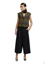 Load image into Gallery viewer, Conna trousers from Créton

Details

Cropped trousers with extra wide legs
Pleats at the front that create an elegant fall
Fixed waistband with belt loops
Large back pockets with flaps
Tinted logo detail on back pocket

Styling
A modern pair of trousers with a bold and feminine silhouette. Style it with a fitted top and heels for parties, or pair it with knitwear and loafers for a casual everyday look.

Fabric
67% polyester, 23% rayon, 10% spandex

A soft, dimensionally stable and stretchy fabric that provi