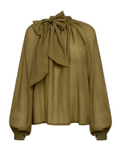 Load image into Gallery viewer, TILLY BLOUSE is a blouse in an exclusive quality with an extravagant, detachable bow detail on the high collar, pleat details, a slit with fabric buttons on the back, as well as long raglan sleeves with a voluminous balloon effect and button closure. Extravagant detachable bow detail High collar Pleat details Loose fit Long raglan sleeves with voluminous balloon effect.
