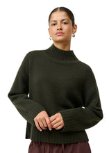 Load image into Gallery viewer, Soft knit in an exclusive wool and cashmere blend
High ribbed neck
Long sleeves with ribbed edges
Dropped shoulders
Ribbed hem

Styling
A luxurious knit that elevates both the everyday wardrobe and the elegant look. Style it with wide trousers and boots, or let a bright colour create a contrast to a simple skirt.

Material
70% mercerized wool, 30% cashmere