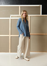 Load image into Gallery viewer, Classic fleece trousers designed in HSCPH’s signature fleece with flattering flared legs and a fresh new detail. The contrasting colour at the hem adds subtle character to the timeless silhouette while keeping the overall look clean and versatile. The length sits perfectly between our styles 2116 and 2115, creating an easy fit that works beautifully across seasons. A relaxed wardrobe piece designed for comfort, movement and effortless styling.
Style them with your favourite top or pair them with the matchin