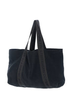 Load image into Gallery viewer, A spacious fleece bag designed for travel, training and weekends away. Made in HSCPH’s signature fleece, it combines a soft feel with a relaxed and practical design for everyday use. The wide straps are finished in the iconic grosgrain logo band, adding both strength and a distinctive graphic detail while sitting comfortably on the shoulder. A versatile unisex bag designed to move easily between everyday routines and travel days.

Use it as a gym bag, weekend bag or carry-on for the plane. The generous size