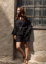 Load image into Gallery viewer, Designed with a boxy, relaxed fit, this kimono jacket has an elegant expression, featuring a soft, open collar that frames the neckline gently and wide sleeves that create a calm, modern silhouette.
The front tie allows for different styling options, making it easy to wear open or closed depending on the look you want.

- 100% EU production
- 100% pure natural hemp
- OEKO-TEX® STANDARD 100 cert. no. 2176-347 DTI
