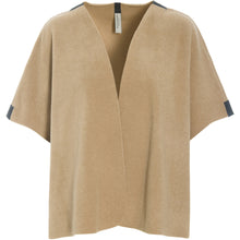 Load image into Gallery viewer, An elegant vest with a cropped, loose fit, designed with side slits and large arm openings for easy layering. Finished with signature grosgrain band details for a refined touch.
A versatile piece that works across all seasons – perfect for a breezy summer evening or layered over a sweater when the temperature drops.
- 100% EU production
- 70% polyester min. 50% recycled
- 30% viscose
- OEKO-TEX® STANDARD 100 cert. no. 2176-347 DTI
- Machine wash, ready to wear after a few hours
