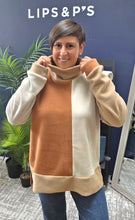 Load image into Gallery viewer, A classic high-neck pullover designed for everyday comfort with a refined and understated look. Made in HSCPH’s signature fleece, it combines warmth with a clean silhouette that works effortlessly across seasons. The high neckline adds extra comfort on colder days while giving the style a more polished finish.
Style it with jeans or matching fleece trousers for everyday wear, or pair it with a skirt and heels for more formal occasions. A versatile piece you will return to season after season.
