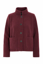 Load image into Gallery viewer, Short cardigan with a shawl collar, pockets and button placket. Short version of the bestseller 7162. Choose your regular size like the model or go oversized for a looser fit.

Perfect as a light stylish piece between seasons and over a shirt for a more classic look. Can also be styled with a pair of shorts and sneakers for summer city tours &amp; open-air concerts.

- 100% EU production
- 70% polyester min. 50% recycled
- 30% viscose
- OEKO-TEX® STANDARD 100 cert. no. 2176-347 DTI
- Machine wash, first tim