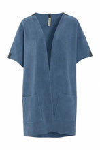 Load image into Gallery viewer, NORMAL FIT&nbsp;
An elegant vest with a straight, loose fit, designed with side slits and large arm openings for easy layering. Cut to a perfect mid-length and finished with pocket details and our signature grosgrain band for a refined touch.
A versatile piece that works across all seasons – perfect for layering over a dress on a breezy summer evening or worn over a sweater when the temperature drops.
- 100% EU production
- 70% polyester min. 50% recycled
- 30% viscose
- OEKO-TEX® STANDARD 100 cert. no. 217