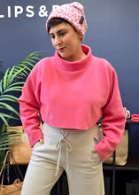 Load image into Gallery viewer, A cropped fleece blouse with a soft roll neck. This long-sleeved pullover features a cropped silhouette, perfect as a second layer over a top or dress, or paired with high-waisted trousers or skirts.
The design combines comfort, functionality, and style, making it a versatile addition to your wardrobe.

- 100% EU production
- 70% polyester min. 50% recycled
- 30% viscose
- OEKO-TEX® STANDARD 100 cert. no. 2176-347 DTI
- Machine wash, hang to dry