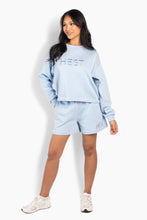 Load image into Gallery viewer, When you're looking for a sweatshirt that exudes both elegance and casual style, the Hést's Gabriella Sweatshirt is sure to catch your eye. This sweatshirt&nbsp; is an excellent choice for those days when you want to feel both comfortable and stylish.

Imagine pairing this gorgeous sweatshirt with your favourite jeans and a pair of sneakers for an effortless everyday look. You can also throw it over a light dress to create a wonderful contrast between the casual and the feminine. Whatever you choose, the Ga