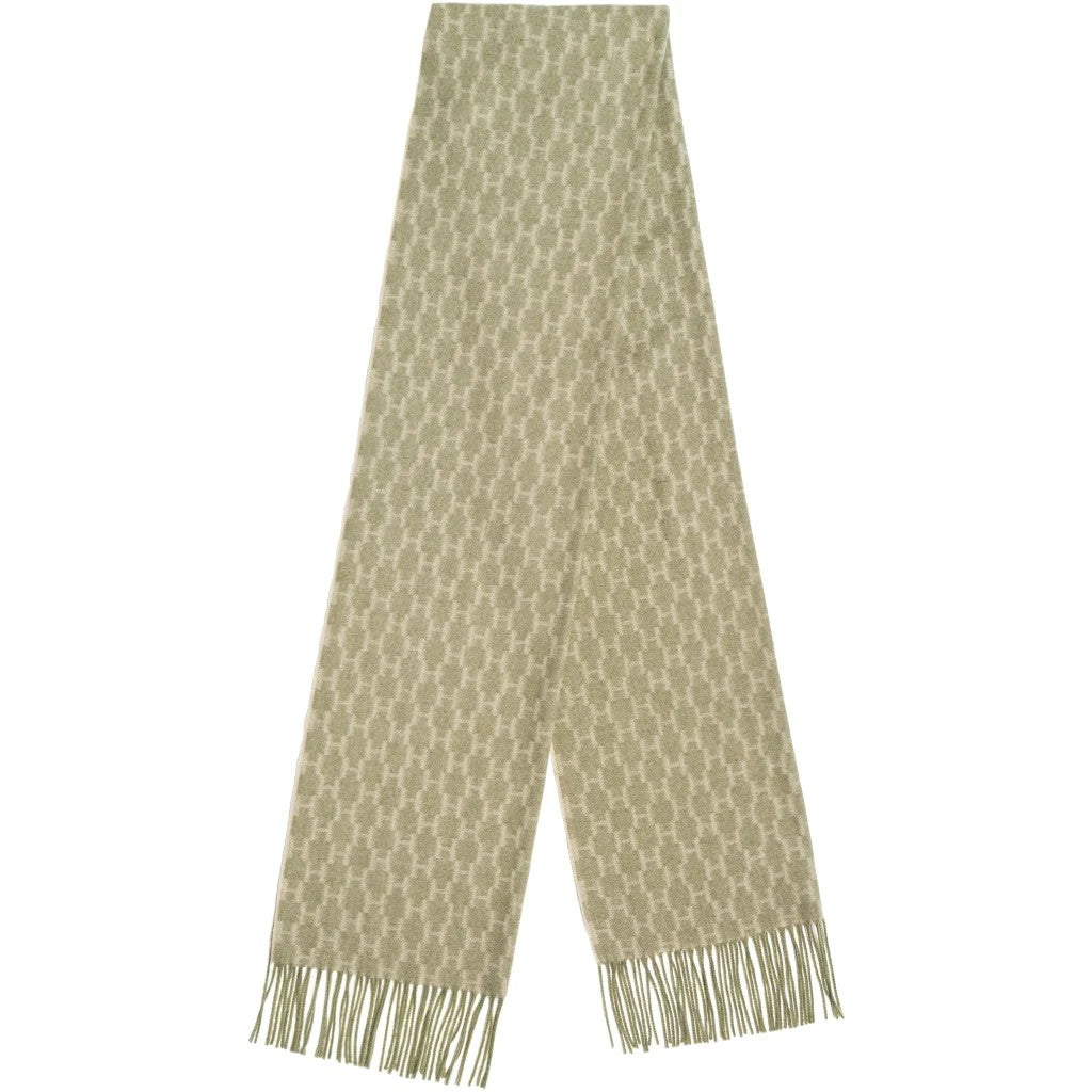 Kim Scarf is crafted from 100% wool with fringed edges and a bold, all-over H pattern.
Soft, warm, and richly textured, it’s designed for both comfort and style.
A luxurious finishing touch to elevate any winter look.
