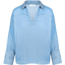 Load image into Gallery viewer, Relaxed silhouette and effortless drape. Designed with a modern popover neckline, soft collar, and curved hem, it offers a clean and understated look. Signature Hést embroidery at the cuffs adds a subtle brand detail, making this versatile piece perfect for both casual and elevated styling. Now in soft and fluid Tencel.