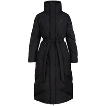 Load image into Gallery viewer, Vilde Coat from HÉST is an elegant and warm long coat in timeless black.

The coat is designed with slanted padding and a matte finish that gives a modern and consistent look. A high, snug neck provides good shelter from chilly winds, while the included tie belt at the waist creates a flattering, feminine silhouette. The comfortable fit allows for good freedom of movement and makes the coat ideal to style over seasonal knitted sweaters and dresses. With practical zippered pockets and HÉST's iconic logo embl