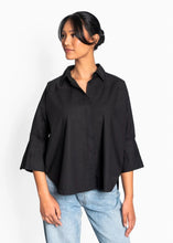 Load image into Gallery viewer, Introducing the ARYA Shirt from Hést, a stylish addition to your Spring Summer '25 wardrobe essentials. Crafted from 100% cotton, this shirt offers both comfort and a fashionable appeal with its woven texture. Designed for women, it features a versatile silhouette and is available in Dutch Blue, Jet Black, and White Alyssum colours. Perfect for pairing with jeans or skirts, the ARYA Shirt seamlessly blends timeless elegance with contemporary flair. Embrace the season with this essential piece that ensures y