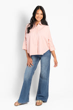 Load image into Gallery viewer, Introducing the ARYA Shirt from Hést, a stylish addition to your Spring Summer '25 wardrobe essentials. Crafted from 100% cotton, this shirt offers both comfort and a fashionable appeal with its woven texture. Designed for women, it features a versatile silhouette and is available in Dutch Blue, Jet Black, and White Alyssum colours. Perfect for pairing with jeans or skirts, the ARYA Shirt seamlessly blends timeless elegance with contemporary flair. Embrace the season with this essential piece that ensures y