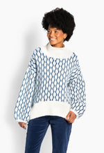 Load image into Gallery viewer, Fam New Pattern, is a sweater in a new interpretation of Hést's iconic Fam style. With an exclusive H-pattern. Designed with a high collar, wide sleeves and a slightly longer back that is a signature of the classic fam sweater that gives an oversized look. Made from a luxurious mohair-merino blend for softness, shape and elegance every day.

MATERIAL: 49% Nylon 35% Merino wool 13% Kidmohair 35% Elastane(spandex)