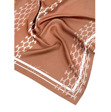 Load image into Gallery viewer, Isadora Silk Scarf Large is a timeless accessory crafted from smooth, lightweight silk with a striking all-over H-inspired motif and graphic detailing. 
Elegant yet contemporary, this scarf adds a refined finishing touch to both everyday outfits and more polished looks.