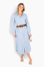 Load image into Gallery viewer, The Bella Dress is a relaxed shirt dress designed with a timeless, easy silhouette and a soft, fluid drape. Crafted from a lightweight fabric with subtle vertical stripes, it offers a fresh and effortless feel for warm-weather dressing. Featuring a classic collar, full button-down front, and long sleeves with gentle cuffs, it balances structure with comfort. Discreet side pockets add practicality, while the straight fit allows for natural movement. A versatile piece that can be worn on its own or open,