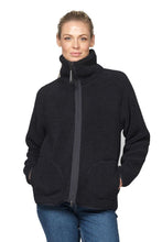 Load image into Gallery viewer, A short soft pile jacket, made to keep you warm without weighing you down.

Cosy meets considered in this short soft pile jacket, made to keep you warm without weighing you down. A decorative grosgrain front zipper and a tall, comforting collar set the tone, while stitched side pockets accented with grosgrain tape add a refined, tactile detail. Even the zipper pullers are finished with grosgrain and a printed Ilse Jacobsen logo. The gently rounded hemline at the back brings a feminine softness to the silhou