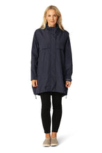 Load image into Gallery viewer, A short raincoat with an A-shaped silhouette and a generously cut yoke. The adjustable hood and cuffs ensure enhanced all-weather protection, while a YKK 2-way zipper sits neatly under the front placket for a clean, streamlined look. Hidden zipped pockets maintain the minimalist aesthetic, and black trims add an urban touch. Crafted from a lightweight 2-layer fabric with a TPU membrane, it offers 8.000 mm waterproof protection and 5.000 g/m² breathability. Fully lined with added mesh at the yoke for extra a