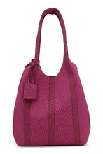 Load image into Gallery viewer, This stylish bag is the perfect companion for carrying your essentials on the go. Crafted from knitted fabric in a trendy pattern, it features a flap with a small press button for a secure closure. The inner sides can be adjusted by tying the inside strings, allowing you to create a unique shape for the bag. As our Bag08 this bag comes with a logo tag, matching the bags knitted design adding a possibility for organization and security for your keys.
