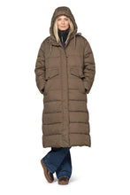 Load image into Gallery viewer, A padded winter coat with vegan thermal insulation, for cold days ahead.

This padded winter coat is designed for dependable warmth and everyday comfort. Cut in a slightly A-shaped silhouette, it falls to just above the knee for balanced coverage and ease of movement. Rounded side slits with push button closures add lightness to the look, while horizontal quilt panels with vegan thermal insulation ensure consistent warmth. The high-density polyester fabric is treated with a Bionic-Finish® Eco coating for wa