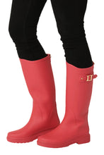 Load image into Gallery viewer, High-shaped knee-length wellingtons that combine practical function with refined style. Designed with a decorative D-ring at the back and a metal logo buckle on an adjustable strap, these boots bring elevated detailing to a classic silhouette. The tone-on-tone finish between shaft and sole enhances the modern, monochrome look.

Crafted with a lightweight EVA and rubber sole for reliable grip on wet surfaces, and lined with soft cotton for added comfort — a sophisticated solution for rainy day dressing.