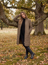 Load image into Gallery viewer, Meet the Neoprene Rain Boot from Ilse Jacobsen, the perfect companion for the ladies who want to combine style and functionality. These high boots are made of 100% neoprene, which makes them not only super comfortable, but also waterproof. Whether you're hiking through the rain or just want to make a trendy statement, these boots are here for you.

With a sturdy block heel, these boots not only offer a good grip, but also a touch of elegance to your outfit. 