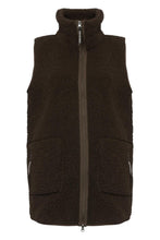Load image into Gallery viewer, Easy layering with a soft touch. This long soft pile vest brings warmth and comfort without the sleeves. A decorative grosgrain front zipper and a tall, comforting collar set the tone, while stitched side pockets accented with grosgrain tape add a refined, tactile detail. Even the zipper pullers are finished with grosgrain and a printed Ilse Jacobsen logo. The gently rounded hemline at the back brings a feminine softness to the silhouette, and a subtle rubber logo at the back completes the look.

Materials: