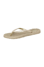 Load image into Gallery viewer, Designed for cheerful summer days, these flip-flops combine comfort, sparkle, and timeless ease. Made from air rubber with induced air for flexibility and lightness, they’re built to move naturally with your step. The textured insole provides a soft massage effect with every wear, enhancing comfort on the go.

The slim straps are adorned with soft glitter, creating a subtle shimmer as you walk — perfect for beach strolls, poolside lounging, or simply adding a playful touch to your warm-weather wardrobe.

