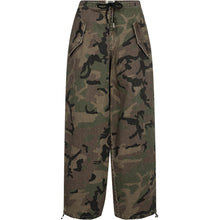 Load image into Gallery viewer, Penny Parachute Pant is your laid-back statement piece – designed in a relaxed silhouette with a mid waist and adjustable drawstrings at the hem. The washed camouflage print adds that perfectly worn-in look, making these pants your go-to for off-duty dressing with an edge.
Size &amp; Fit:
• Loose fit
• Mid waist
• Adjustable hem
• True to size
Details:
• Washed camouflage print
• Elasticated waist with drawstring
• Flap front pockets
• Pull-on style