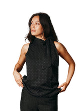 Load image into Gallery viewer, Top with a halterneck and long ties at the neck. It fits loosely and comes in a beautiful chiffon quality with stones. The model is 176cm and wears a size 36.