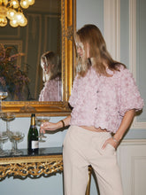 Load image into Gallery viewer, Cute top with loose short sleeves and button closing at front. The model is 176 and is wearing a size 36.