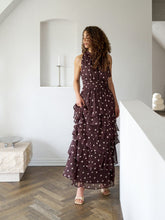 Load image into Gallery viewer, Nice long dress with dots that ties at the neck. The dress has smocking under the bust and a loose skirt at the bottom. The model is 176 cm tall, and is wearing a size 36.