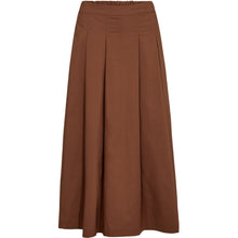 Load image into Gallery viewer, A timeless wardrobe staple, the Tulip Skirt in Black is designed with a flattering high waist and elegant pleating that creates graceful movement with every step.
Size &amp; Fit:
• High-waisted fit for a defined silhouette
• Full length with a soft A-line shape
• Structured pleats add volume without bulk
Details:
• Invisible side zip closure for a smooth finish
• Unlined for breathable comfort