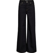 Load image into Gallery viewer, Asta Jeans in Power Crude Indigo deliver a bold wide flare silhouette with clean lines and modern ease. Designed with a high waist and full-length fit, they create an elongating shape while keeping a relaxed, confident attitude.
Crafted from structured denim with contrast stitching for definition.
Size &amp; Fit
• High waist
• Wide-leg silhouette
• Full length
Details
• Five-pocket design
• Zip and button fastening
• Contrast stitching
• Structured denim