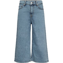 Load image into Gallery viewer, Asta Culotte brings a modern, off-duty edge to classic denim. Designed with a flattering high waist and wide, cropped legs, this style plays with proportions for a bold yet wearable silhouette.
The structured fit creates definition at the waist while allowing ease through the leg.
Size &amp; Fit
• High waist
• Wide culotte leg
• Cropped length
Details
• Classic five-pocket design
• Zip and button closure
• Belt loops