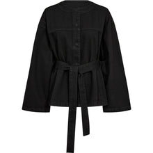 Load image into Gallery viewer, Chloe Jacket is crafted from soft garment-washed denim and designed in a relaxed silhouette with a clean collarless neckline. The self-tie belt defines the waist, creating a flattering shape while maintaining an effortless feel.
Size &amp; Fit
• Relaxed fit
• Adjustable waist belt
• Hip-length silhouette
• Wide sleeves
Details
• Hidden front button closure
• Self-tie belt
• Side pockets
• Collarless neckline
